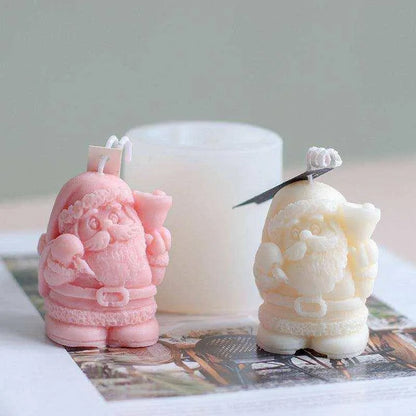 a couple of candles sitting on top of a table