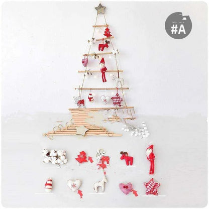 a christmas tree made out of wooden pegs