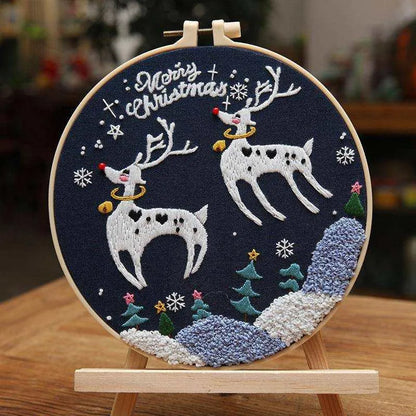 a picture of two reindeers on a blue background