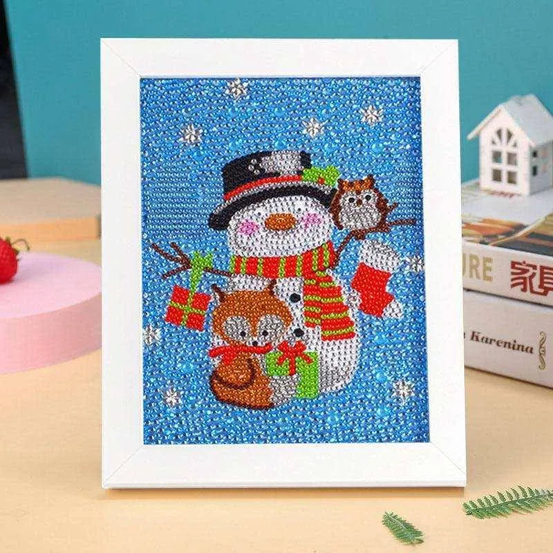 a picture of a snowman on a table