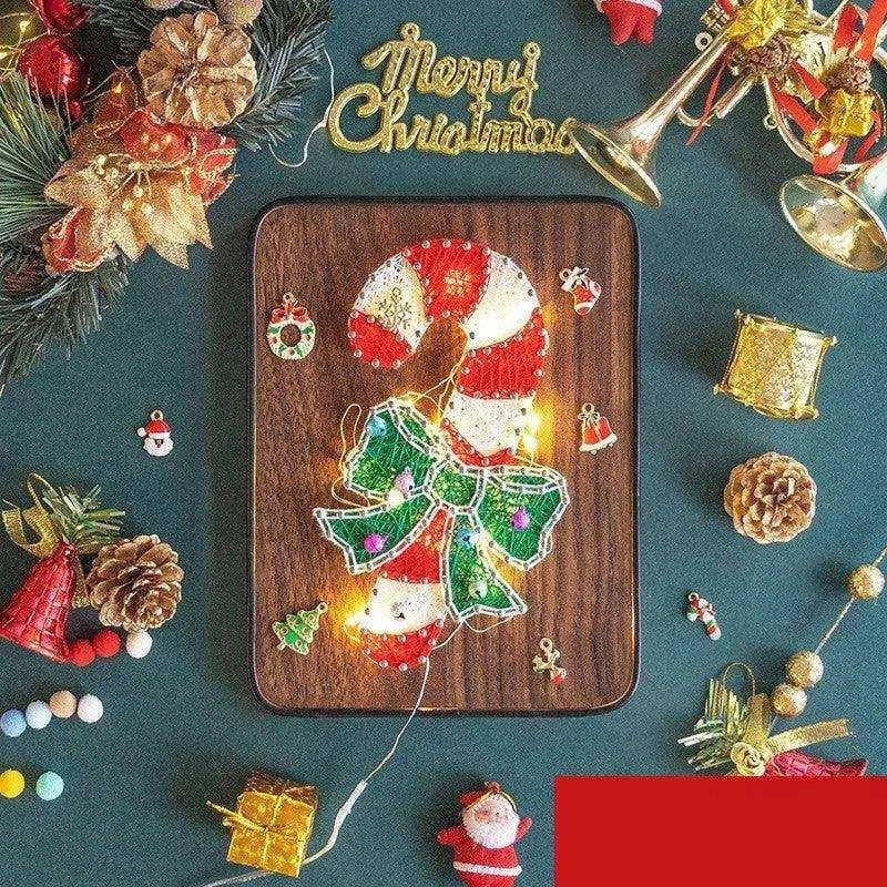 a wooden board with a christmas decoration on it