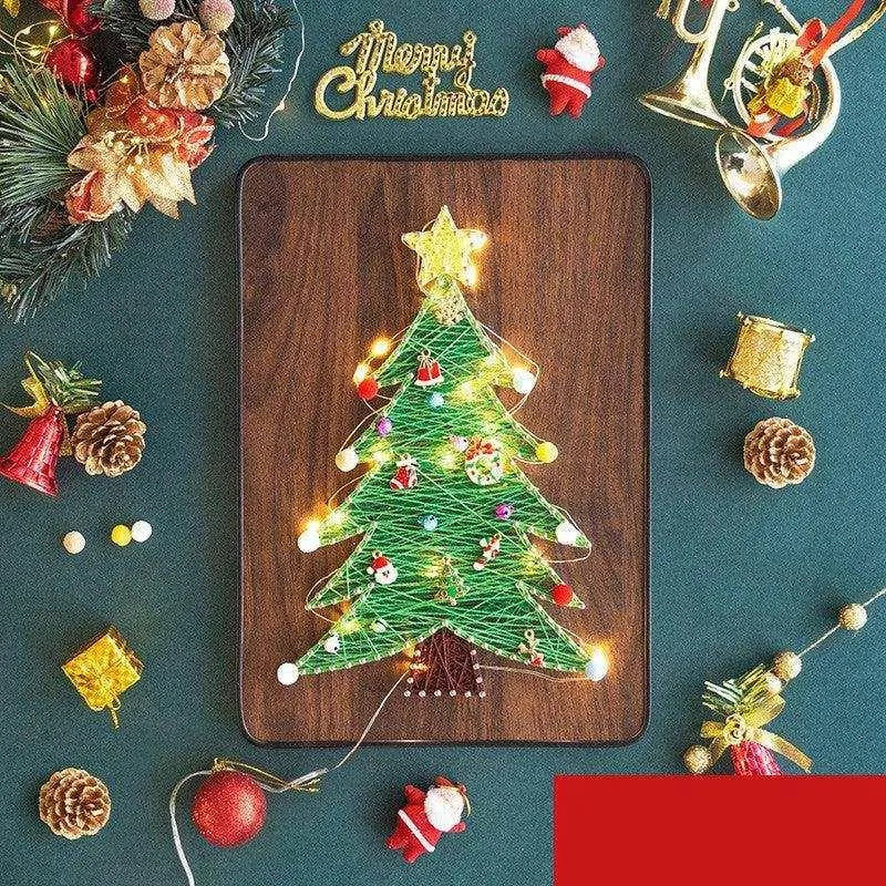 a wooden cutting board with a christmas tree on it