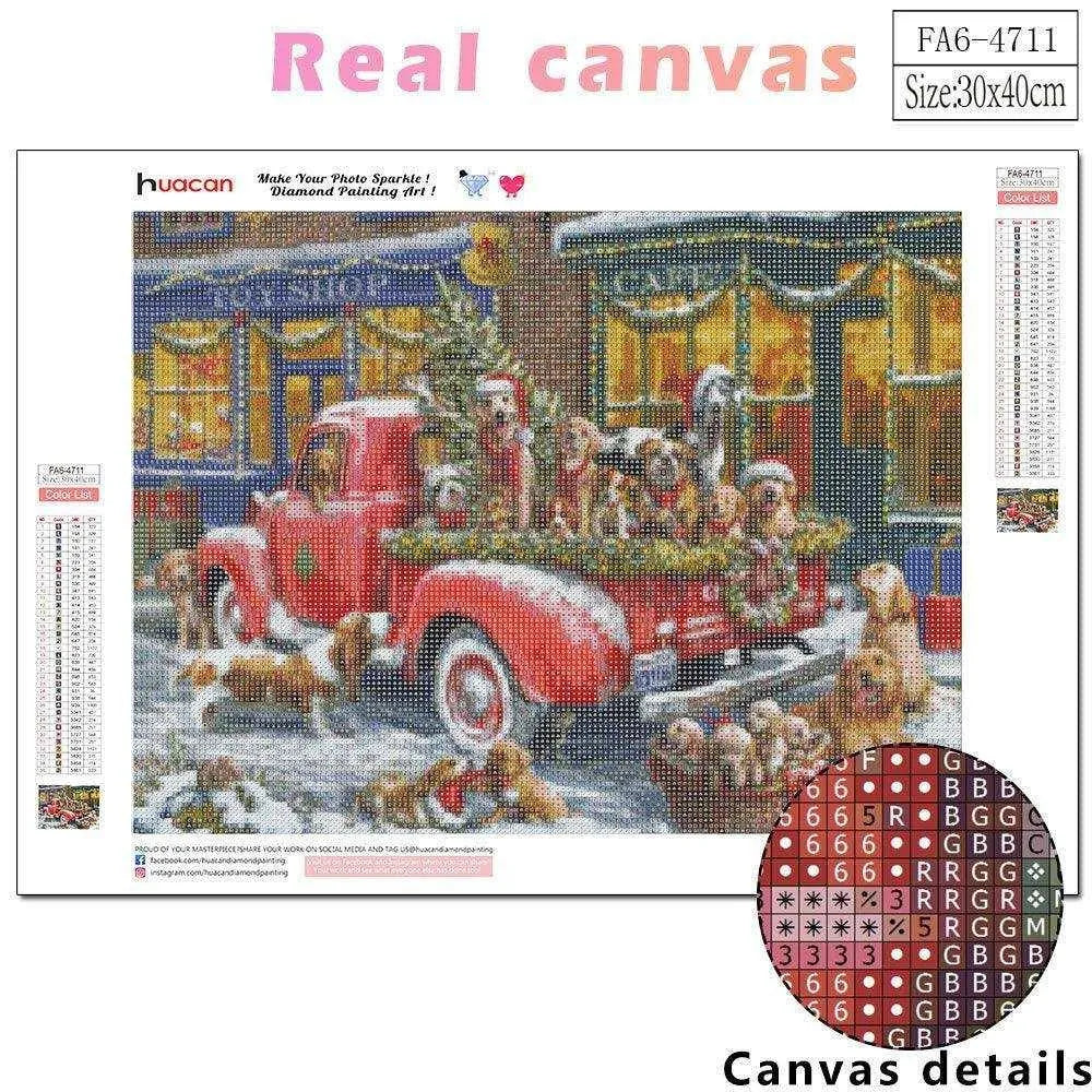 a cross stitch picture of a red truck with dogs