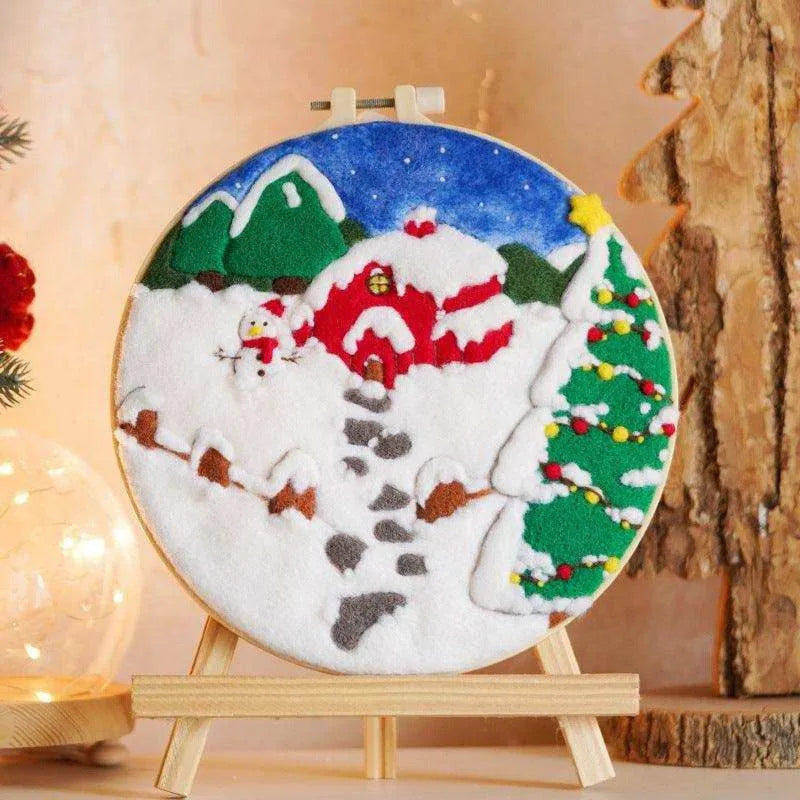 a picture of a christmas scene on a wooden easel