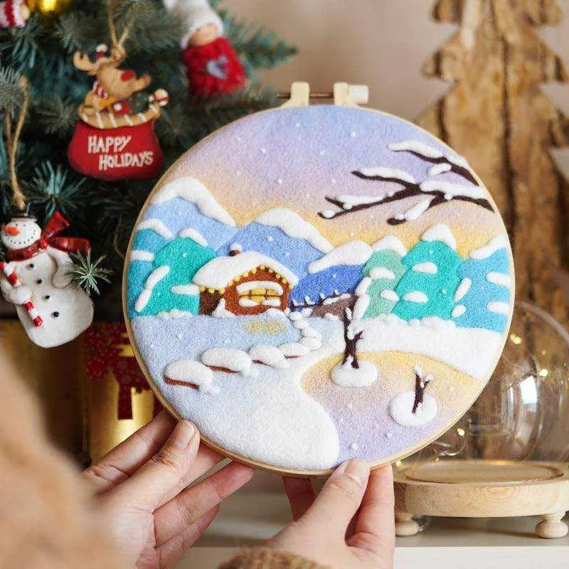 a person is holding up a christmas ornament in front of a christmas tree