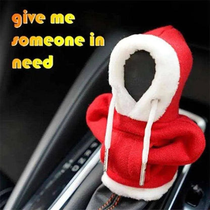 a car dashboard with a red and white hoodie