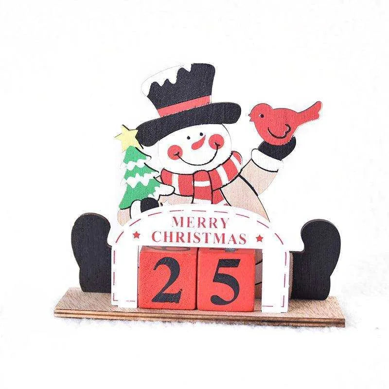 a wooden calendar with a snowman holding a christmas tree