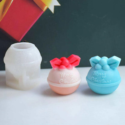 three small vases with bows on them sitting on a table