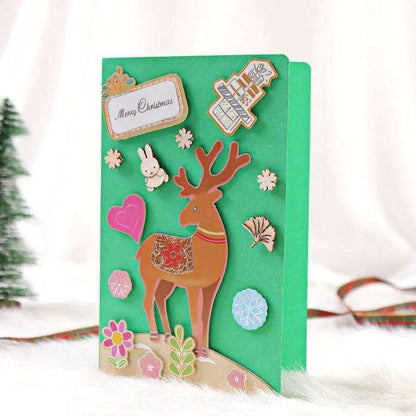 a christmas card with a picture of a deer