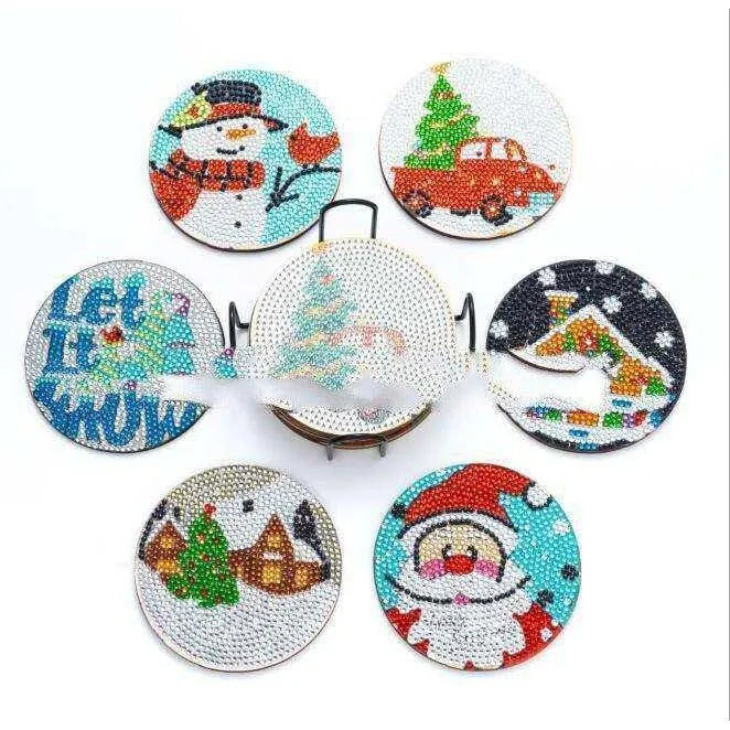 a set of six christmas coasters sitting on top of a table