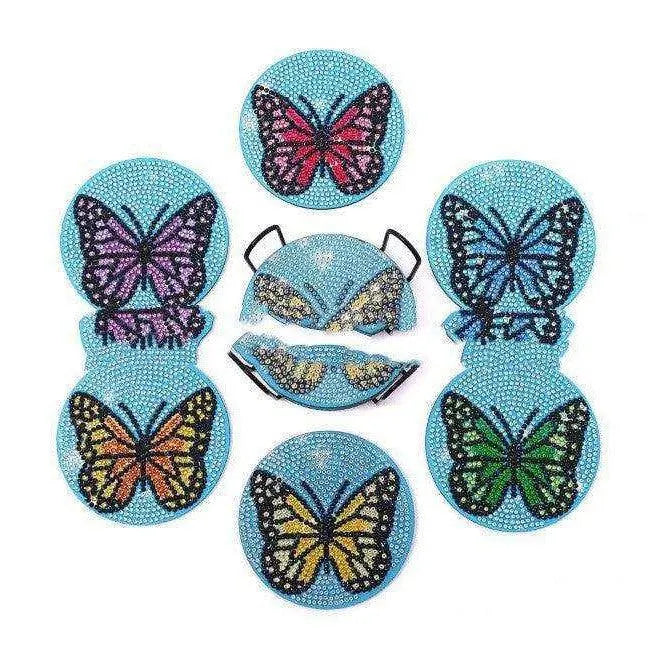 a set of six butterfly coasters on a white background