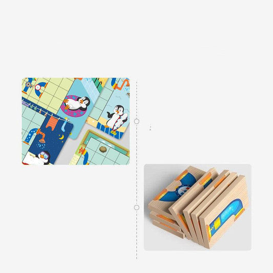 Close-up of game board featuring little penguin artwork and puzzle pieces