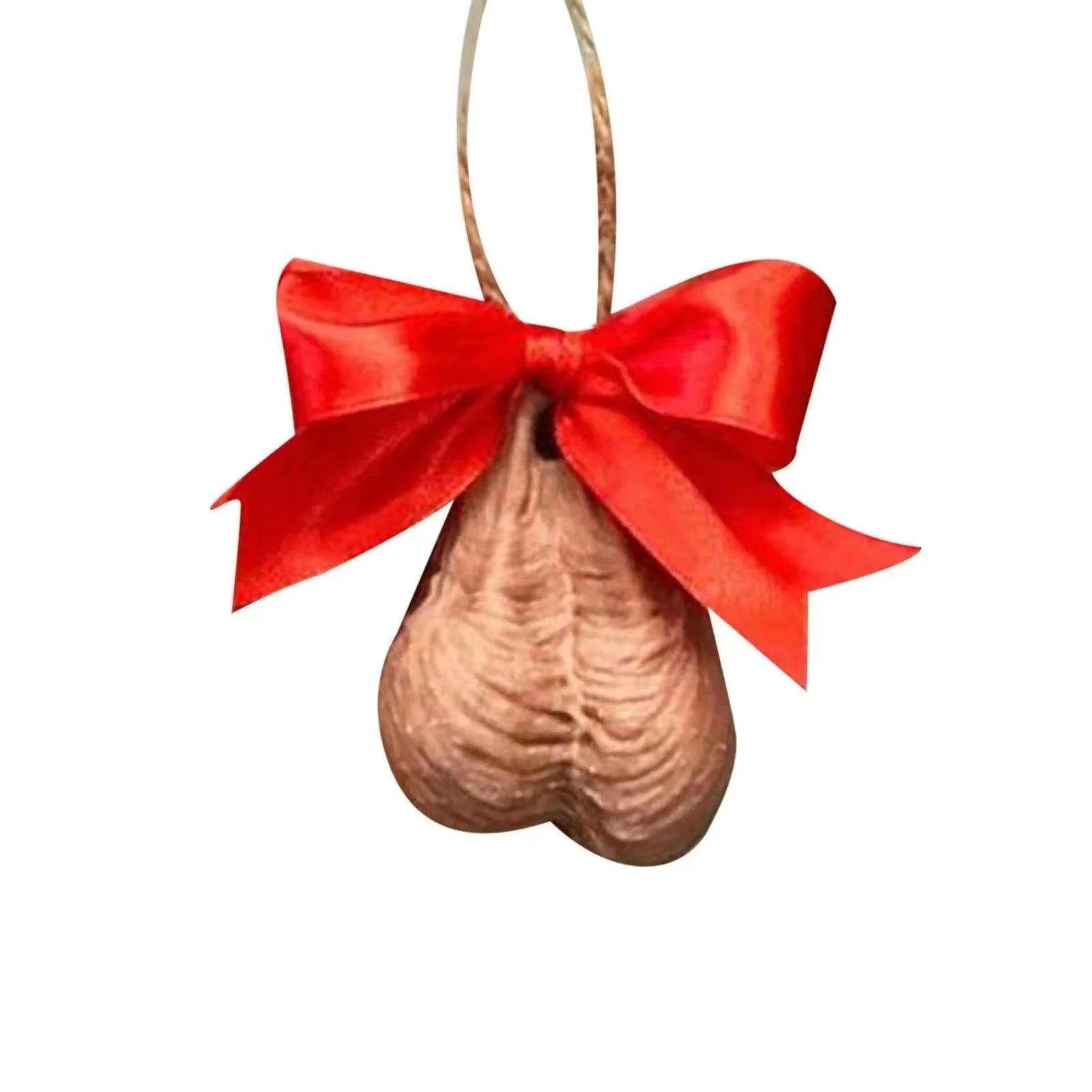 a wooden ornament with a red bow on it