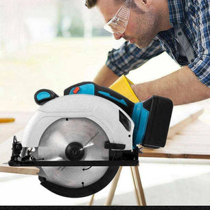 a man using a circular saw to cut a piece of wood
