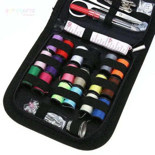 Portable travel sewing kit in use during a DIY repair project