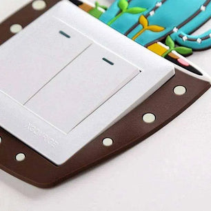 Close-up of vibrant succulent design on switch cover