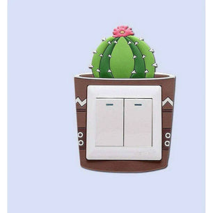 Decorative electrical switch cover with succulent pattern in a room