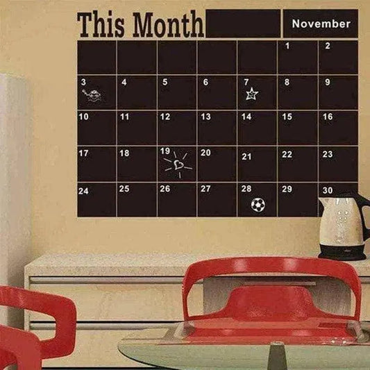 Modern home office featuring a wall chalkboard calendar